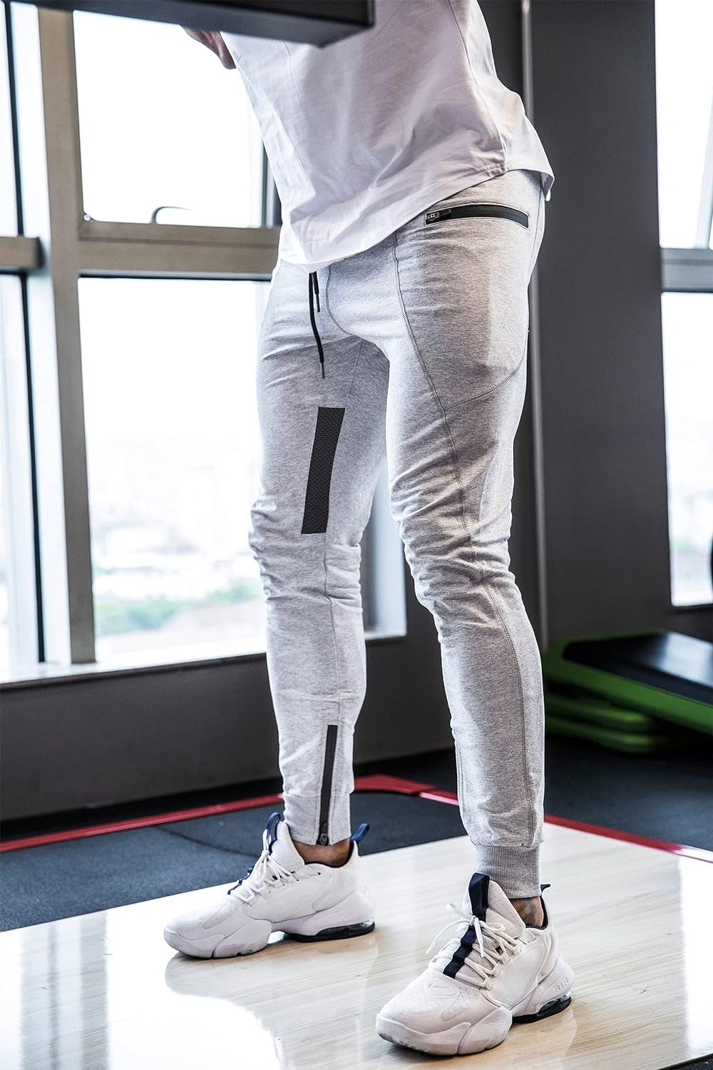 Back view of the joggers showing shaping around seat and legs, ergonomic seam lines, and how they contour during movement.