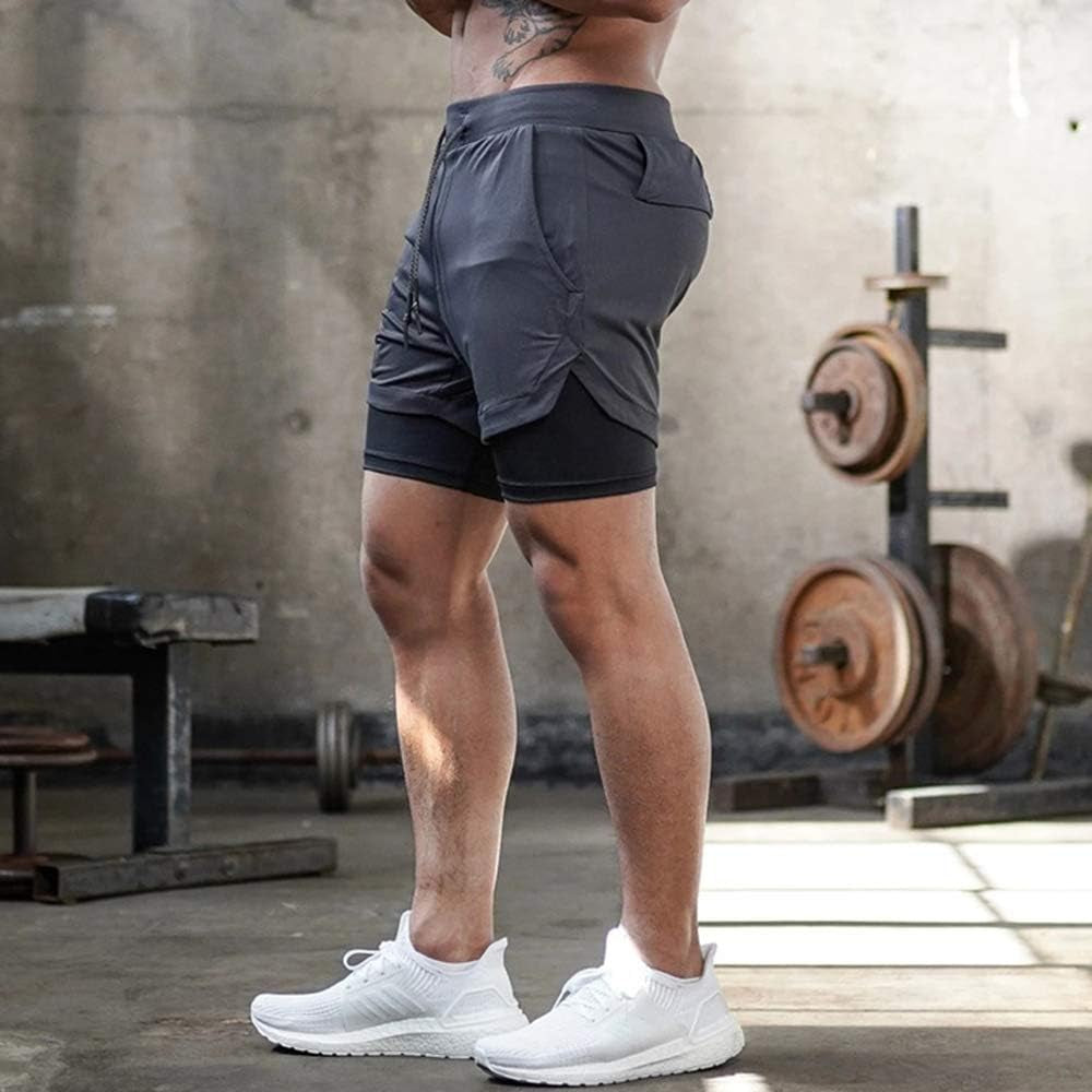 Back view of the running shorts showing elastic waistband, rear zip pocket, seam structure, and how it contours the hips for secure fit.