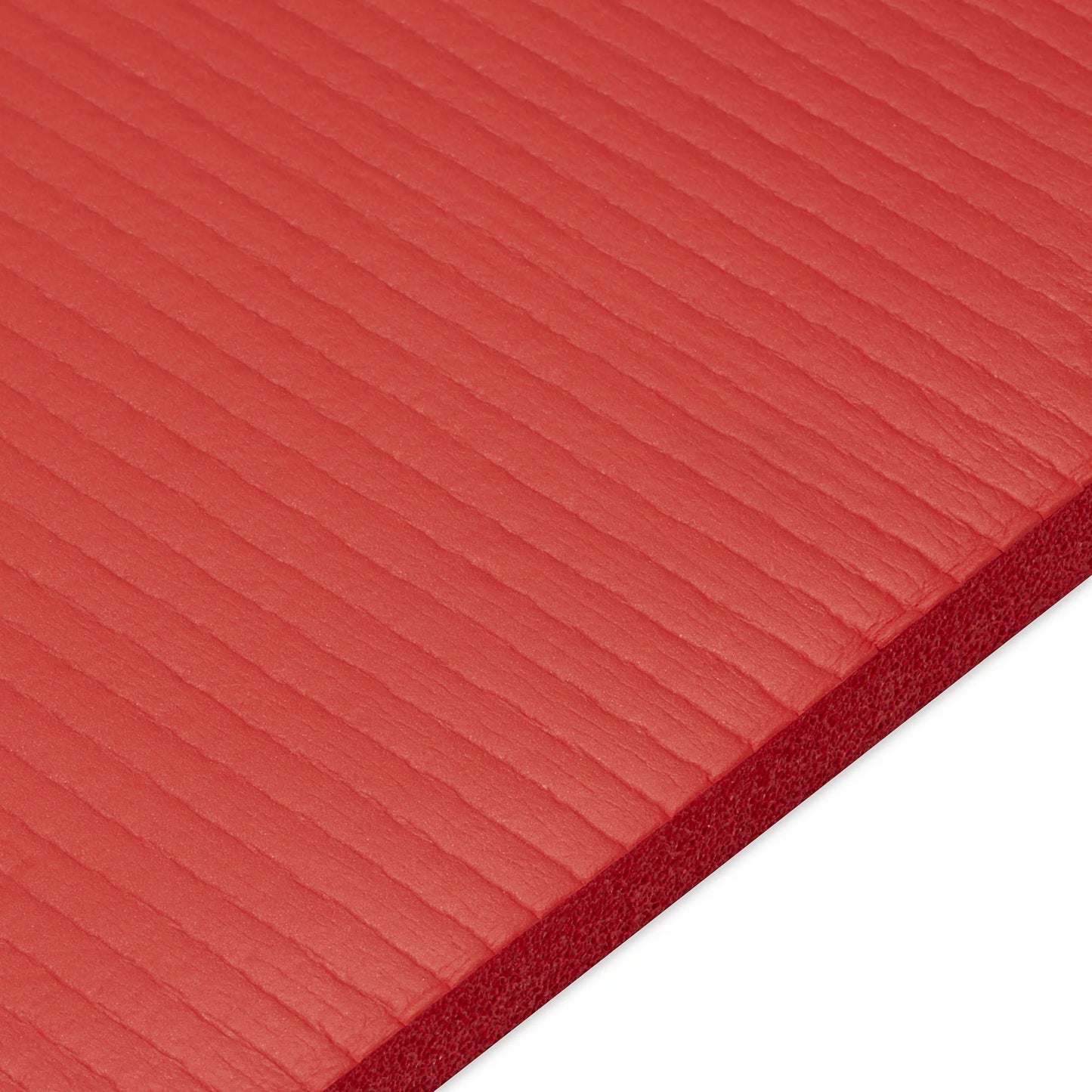 Person performing floor exercise on red 15 mm Pro Fitness Mat