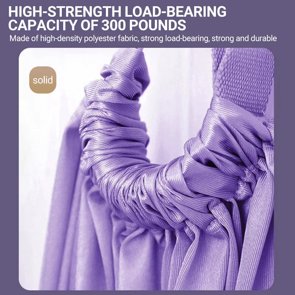 Hammock inversion stretching gear mounted from ceiling with aerial yoga straps hanging down — showing setup and usage environment for inversion training.