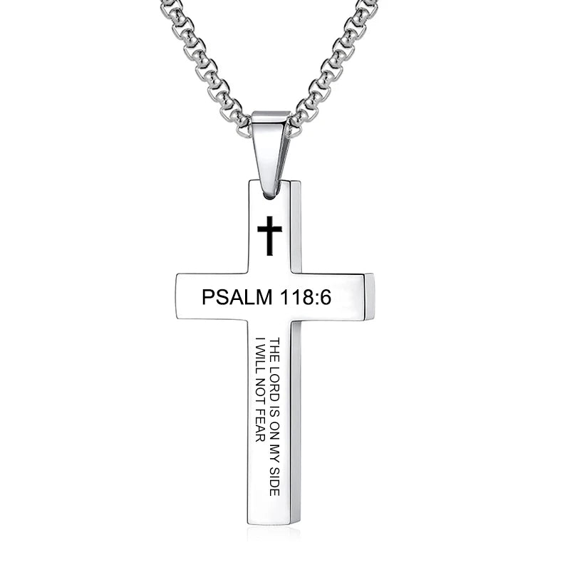 Multiple angle views of the cross pendant (front, three-quarter, side) to show its profile, depth, and how the light plays across its surfaces.