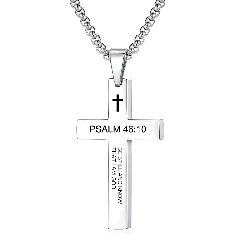 Cross pendant placed near an open Bible or scripture page, setting a faith-inspired context and reinforcing the spiritual theme of the product.