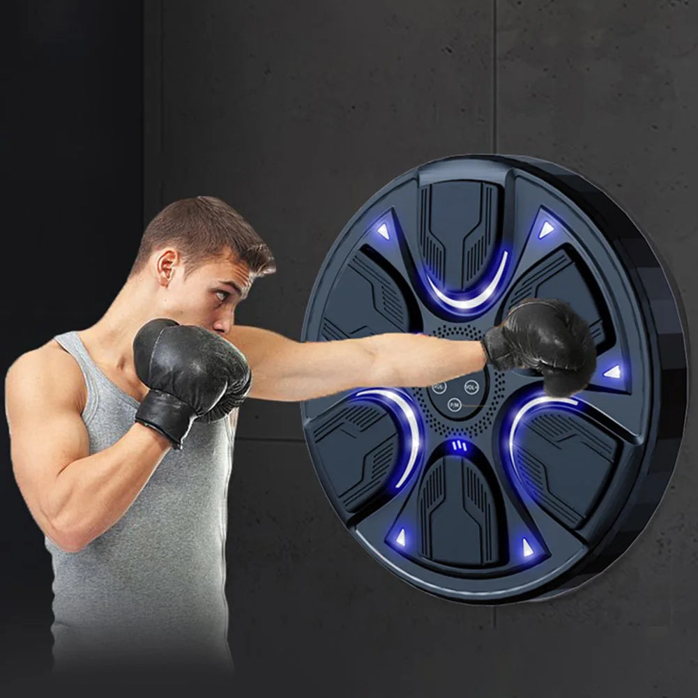 Close-up on the integrated speaker, audio output, and music or sound cues section of the boxing machine, highlighting the “music” component of the device.