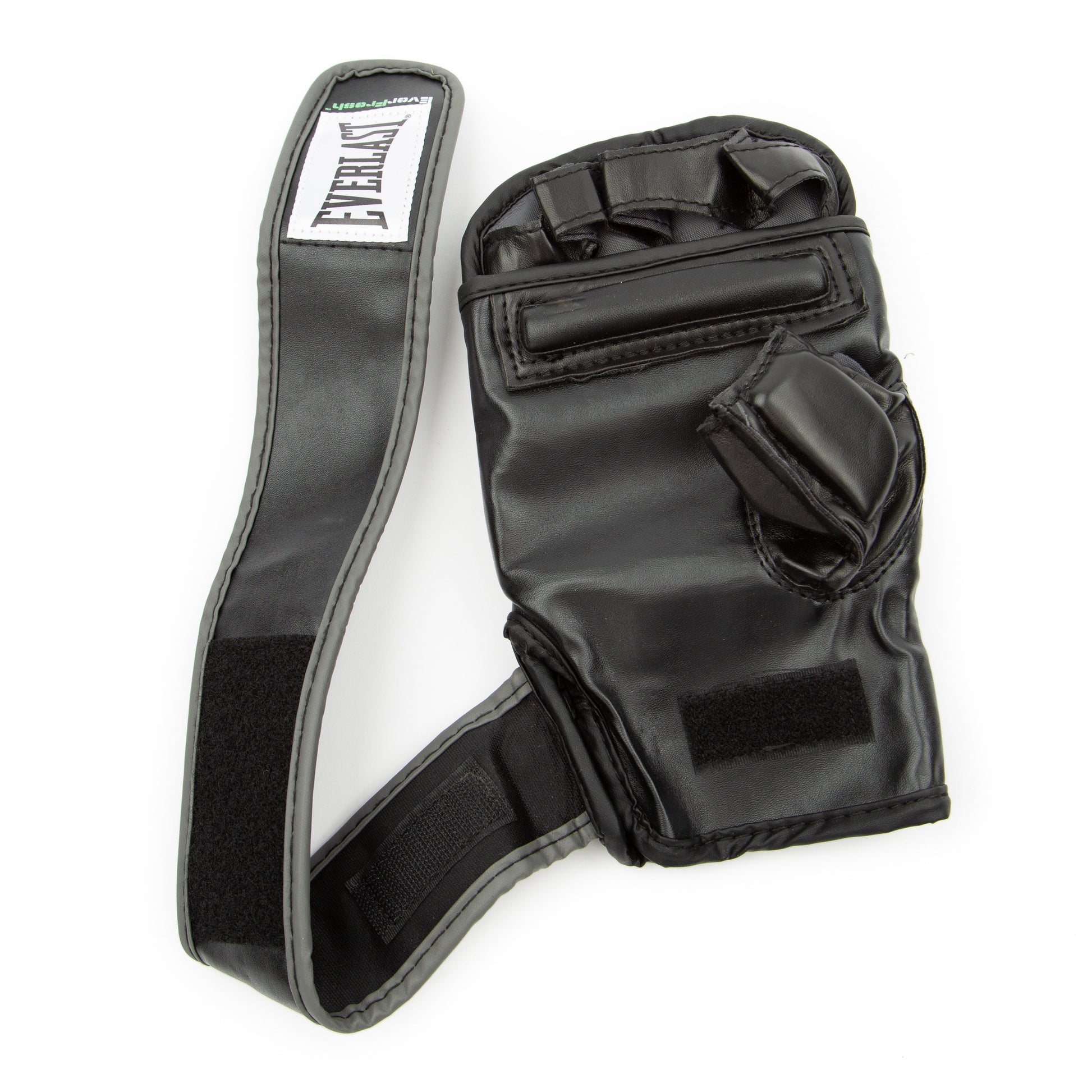 User striking a heavy bag while wearing the black boxing wristwrap gloves, demonstrating real use, wrist stability, and impact distribution.