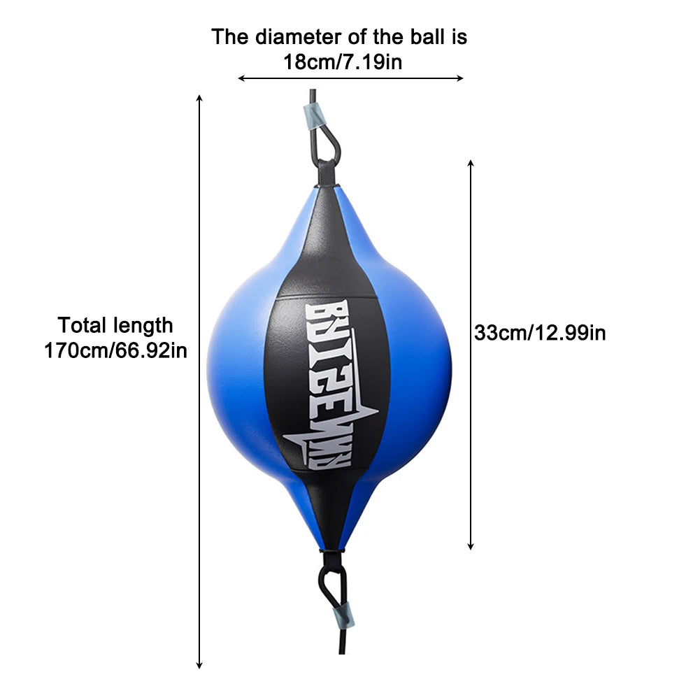 Desktop punching ball in use at an office desk setting, surrounded by monitor, keyboard and papers — showing how it fits into a workspace environment.