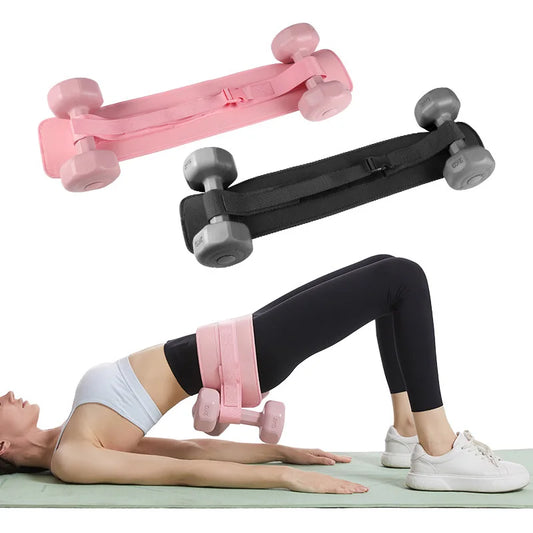 Hip thrust belt in use with dumbbell placed across hips on the padded area — showing correct placement and comfort during glute bridge or hip thrust exercise.