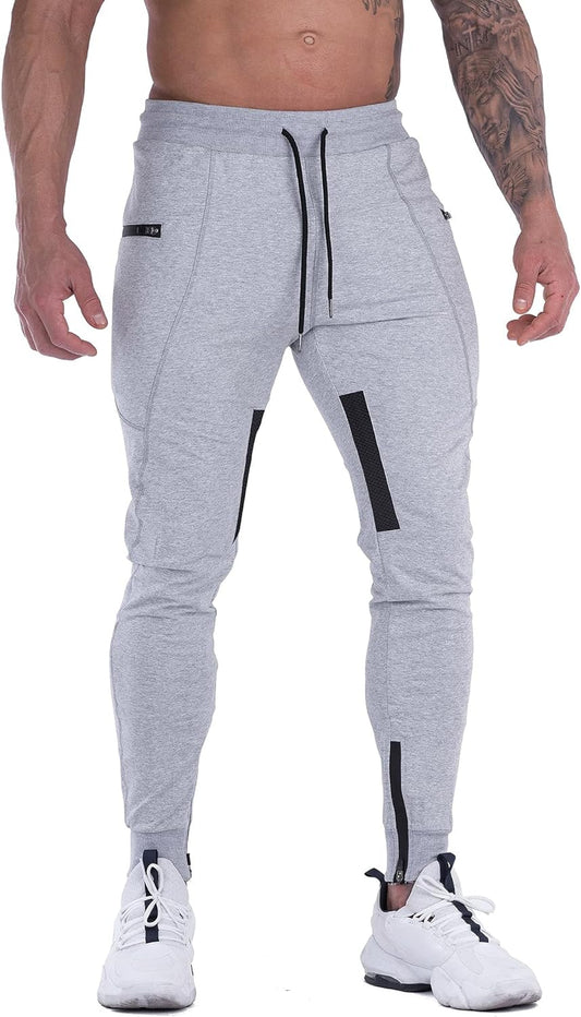 Men’s mesh training joggers front view showing tapered fit, breathable mesh panels at sides, stretch waistband, ideal for gym and workout performance.