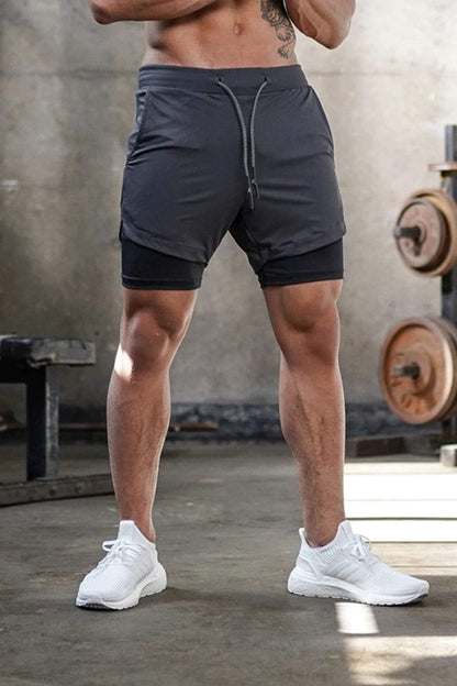 Model wearing the shorts in outdoor run, motion blur in the background emphasizes how the shorts move naturally with the runner in real use.