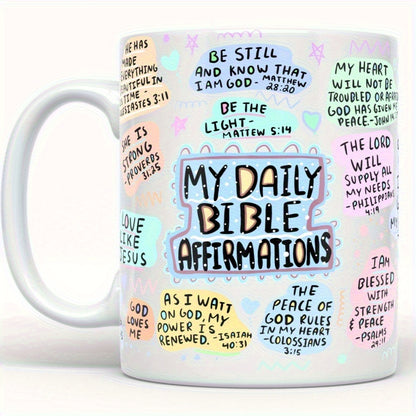 Mug held in hand to show scale and how the scripture or affirmation print wraps around, demonstrating how the design looks when used daily.