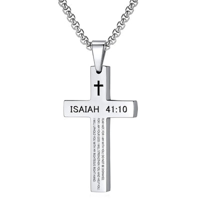 The cross pendant necklace packaged in a gift box along with the chain and protective inserts, showing how the product is presented to the buyer.