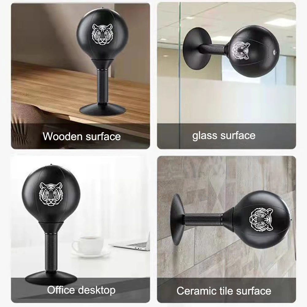 Punch ball mounted firmly on glass surface or desk edge, demonstrating how the suction cup adheres to smooth surfaces for desktop training.