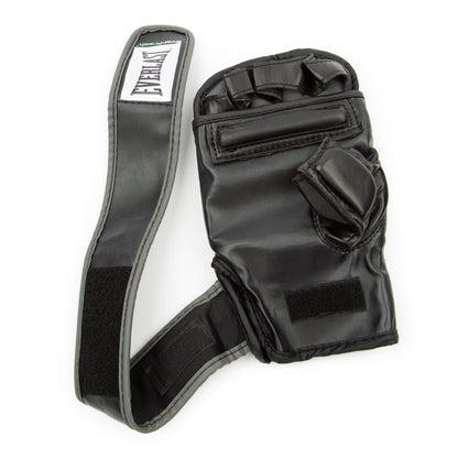 User striking a heavy bag while wearing the black boxing wristwrap gloves, demonstrating real use, wrist stability, and impact distribution.